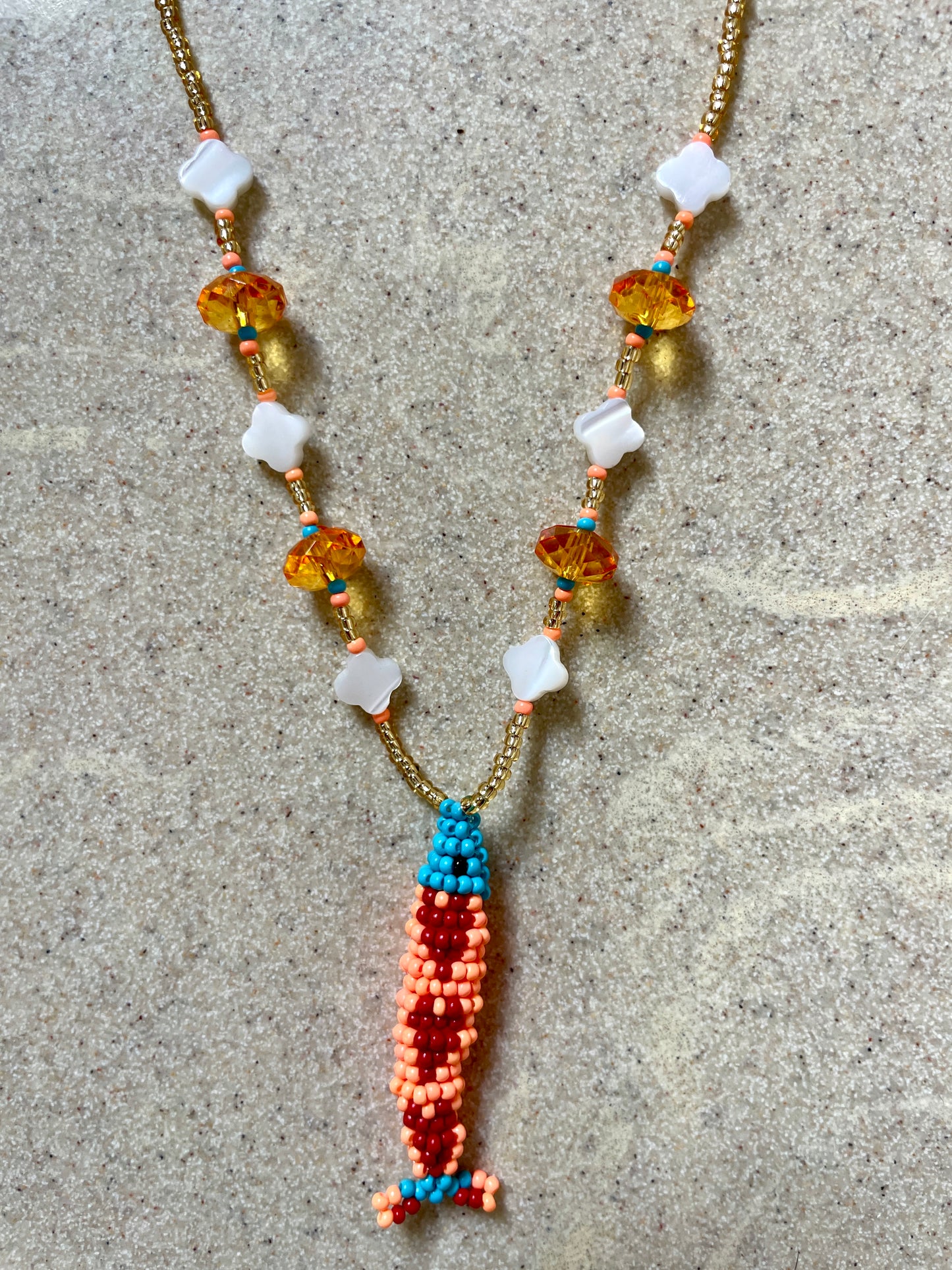Collier perles - Bande de sardines | Doré corail