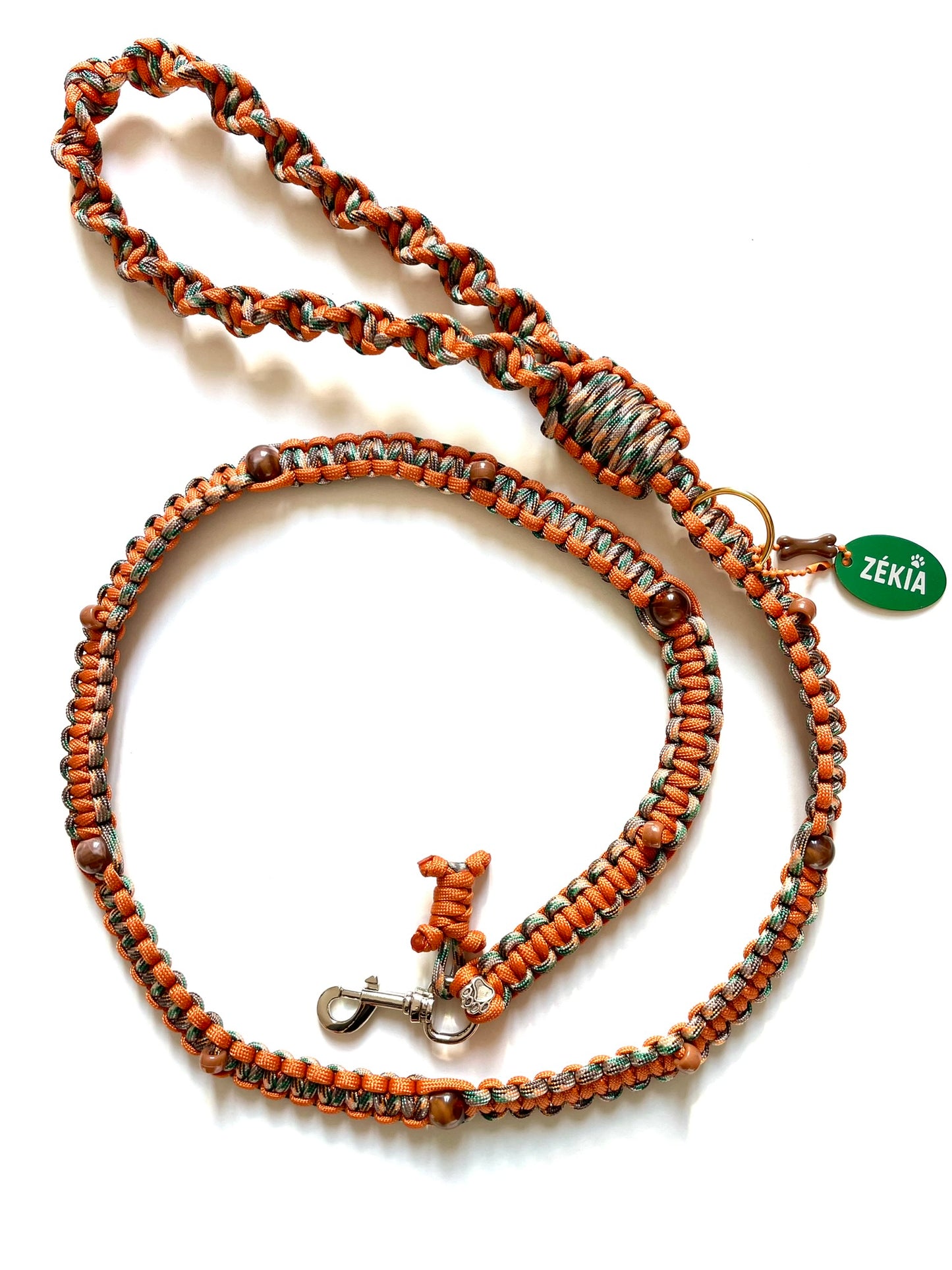 Laisse pour chien en paracorde solide. Couleurs : orange, beige et vert