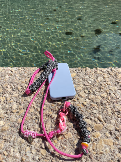 lanière de téléphone ajustable en paracorde solide rose. Fait main, France.