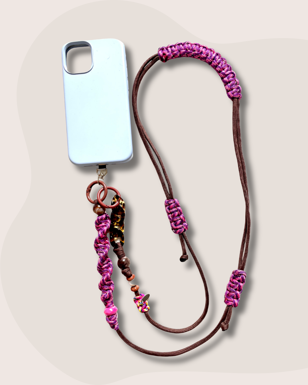 cordon telephone paracorde solide ajustable marron et rose