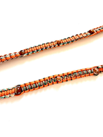 Laisse pour chien en paracorde solide. Couleurs : orange, beige et vert